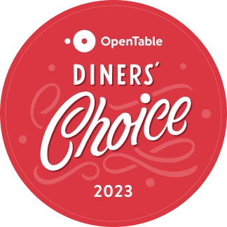 This is a red circular badge for the "OpenTable Diners' Choice 2023" award, featuring artistic white text and a patterned background. logo on footer section.